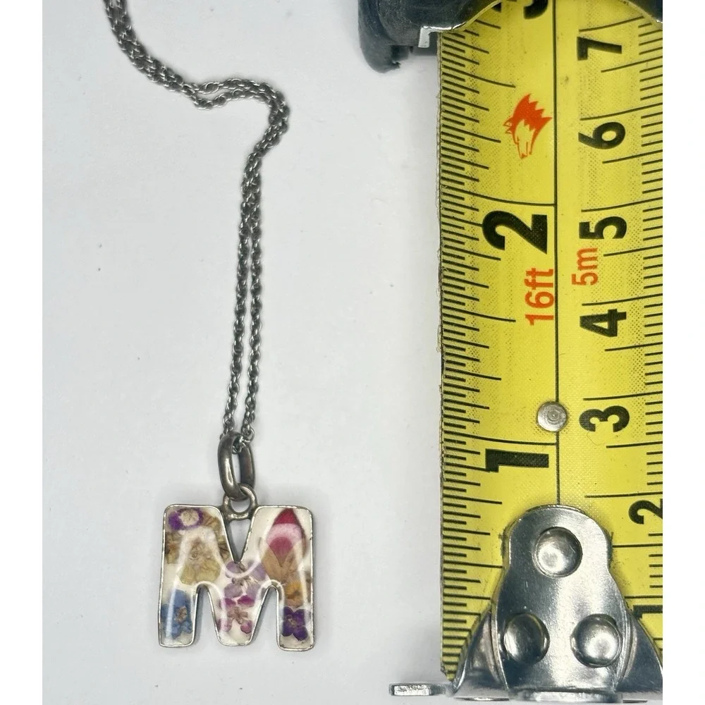 Sterling pendent sided